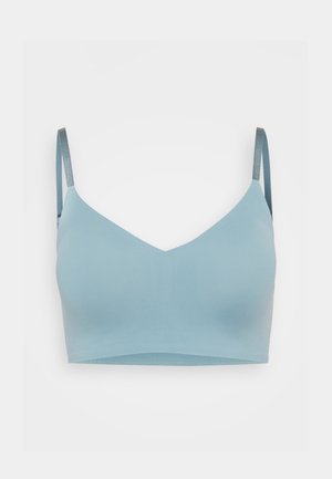 Ljusblå bralette med V-ringning, mjukt tyg, justerbara grå remmar och utan spännen, vilket ger en sömlös look.