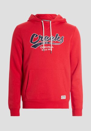 Sudadera roja con un bolsillo frontal, capucha con cordón y un gran logo de "Creeks". Material de algodón con puños y cintura acanalados.