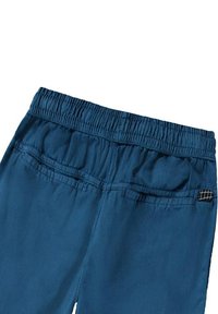 Niebieskie spodnie z elastycznym pasem, z lekkiego materiału, z dwiema tylnymi kieszeniami z przeszywanymi detalami, gładka tekstura i wzmocnione szwy.