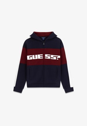 Marineblauwe en bordeauxrode hoodie met rits, witte accenten, een groot "GUESS?" logo op de voorkant, twee zijzakken en een capuchon met trekkoord.