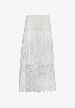 Valge pits-seelik, millel on elastne vöökoht ja kihiline disain, keerukate mustritega kogu kangas ja voolav siluett.