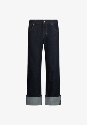 Jeans in denim blu scuro con una vestibilità ampia, caratterizzati da un orlo arrotolato e cuciture a contrasto. Design classico a cinque tasche con chiusura a bottone frontale.