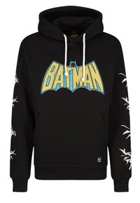 Felpa nera con cappuccio caratterizzata da una grande grafica colorata "BATMAN" sul davanti. Corde bianche e grafiche bianche dettagliate sulle maniche. Tessuto morbido.