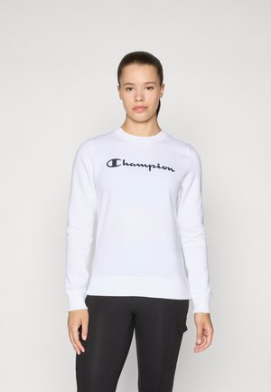 Sweatshirt blanc en mélange de coton avec des manches longues, des poignets côtelés et un col rond. Présente un logo noir "Champion" sur la poitrine.