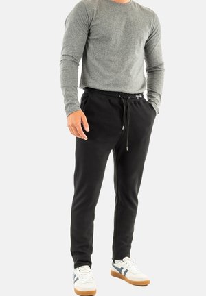 Pantalones deportivos - noir