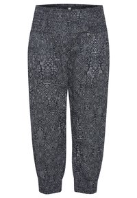 Marinblå byxor med ett vitt paisleymönster, avsmalnande anklar och elastisk midja, tillverkade av ett mjukt, texturerat tyg.