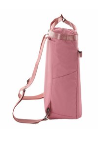 Pink fabric bag with a structured, rectangular shape, featuring a wide strap and side pockets. Smooth texture with a metallic accent on the strap.