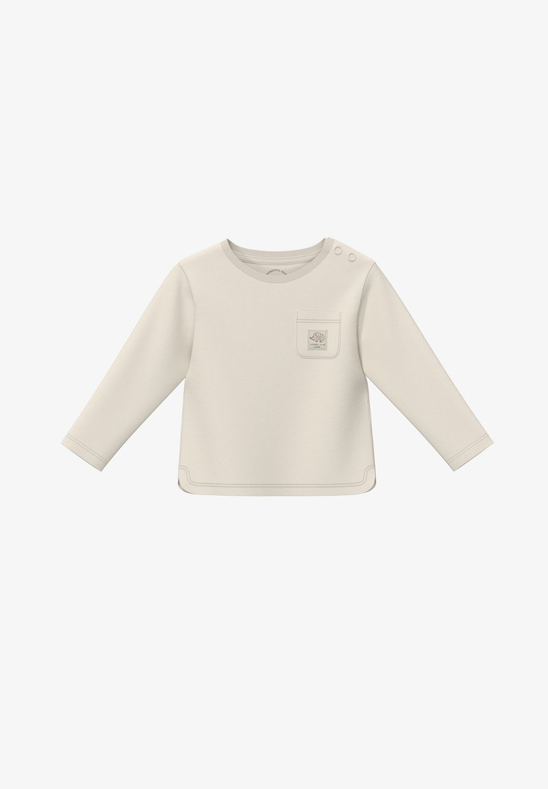 Pikad varrukad kreemivärvi särk pehmest kangast, millel on ümmargune kaelus, külgedel nupud ja väike rinnakott graafilise disainiga.