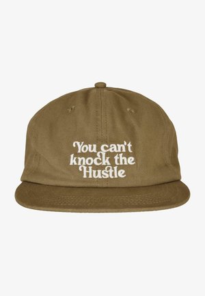 Olive green cap with a flat brim, featuring white embroidered text that reads, “You can't knock the Hustle.” Cotton fabric with a textured finish.
