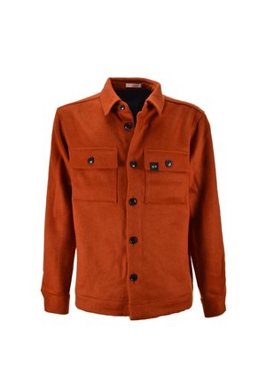Giacca camicia arancione ruggine realizzata in tessuto testurizzato, con colletto a punta, chiusura frontale con bottoni e due taschini sul petto con chiusura a bottone.