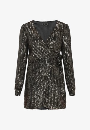 Melna apģērba kleita ar garām piedurknēm, kas izceļas ar mirdzošu sekvīnu rakstu un saišu akcents jostas vietā. Strukturēta auduma, līdz ceļiem garums.