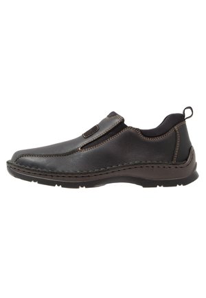 Sorte slip-on sko lavet af læder med kontrasterende brune syninger, rund tå og fleksibel gummisål. Har elastiske sidepanele.
