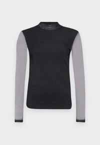 Sorte langermet topp med høy hals, med gjennomsiktige grå ermer og en glatt svart kropp. Designet med en tettsittende silhuett.
