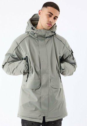 LONGUE MULTIPOCHES - Parka - olive