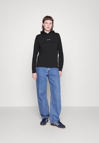 Calvin Klein MICRO LOGO ESS - Hoodie - black