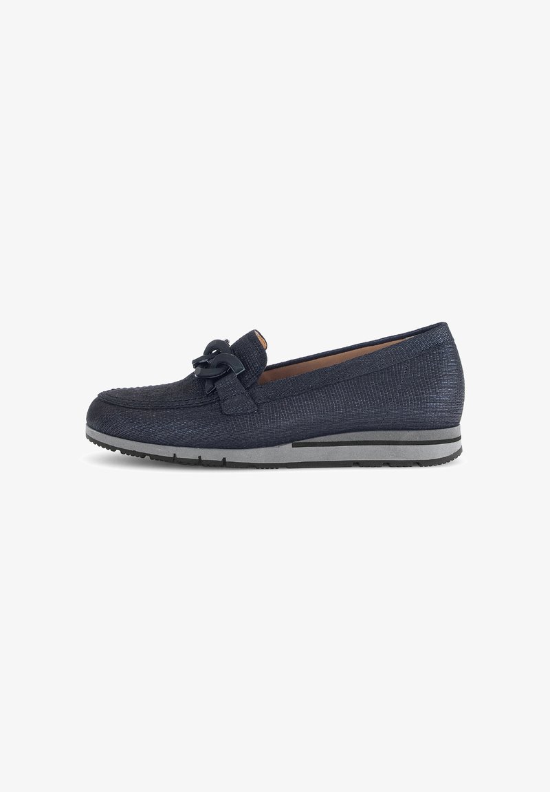 Navy blue loafer with a textured finish, featuring a decorative bow on the vamp and a gray rubber sole with a slight heel.