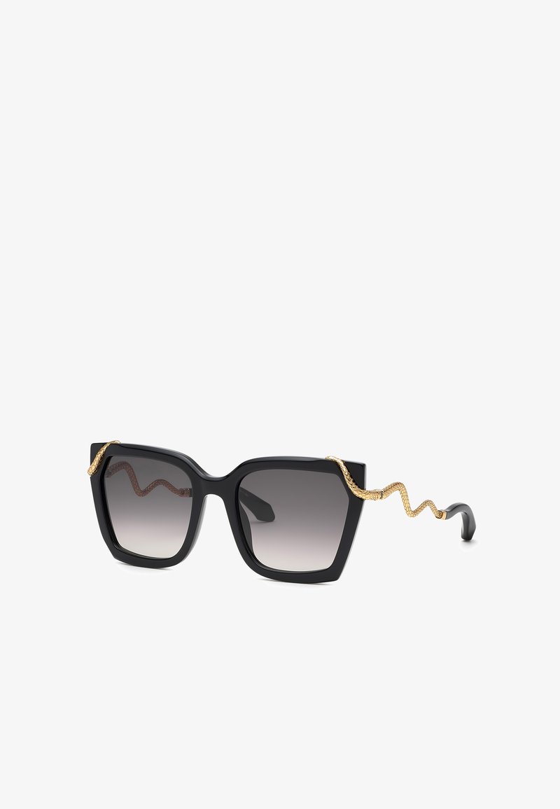 Lunettes de soleil carrées noires oversize avec verres dégradés et détail serpent doré le long des branches et des branches.