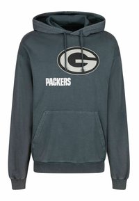 Grå hoodie i bomull, med en framfickan i känguru-stil, snörning i huvan och en stor oval logotyp med "PACKERS" i vit text.