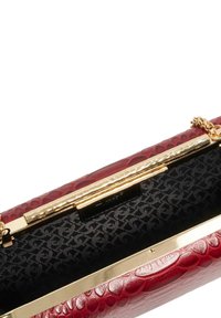 Red textured leather clutch with a gold-tone clasp. Interior features a black patterned lining. Chain strap included.
