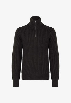 Suéter de punto acanalado gris oscuro, con cuello alto y cremallera corta. Presenta mangas largas y un dobladillo inferior ajustado.