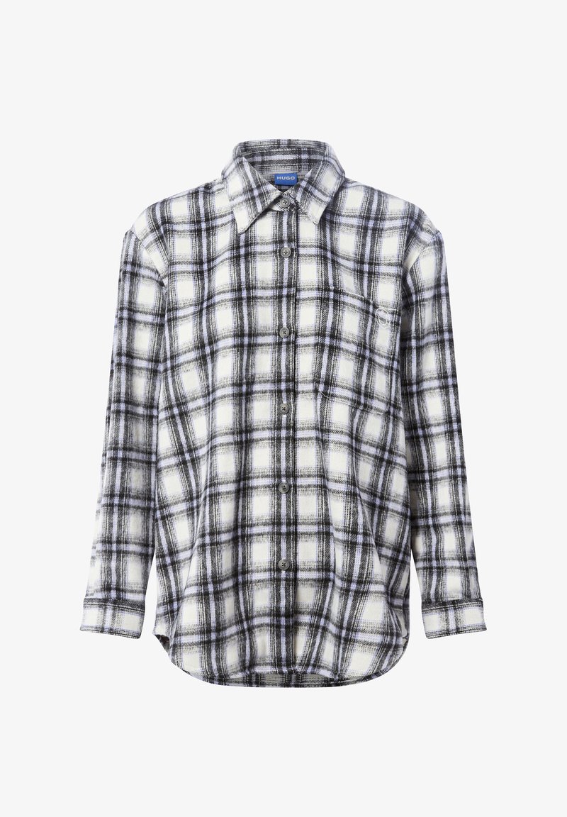 Checked flannel shirt in white, black, and grey; features a collar, button front, long sleeves, and a chest pocket. Soft texture.