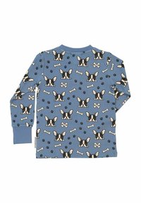 Pitkähihaisessa sinisessä paidassa on mustavalkoisten koirien, luukuvioiden ja tassunjälkien kuvio. Valmistettu pehmeästä ja kevyestä kankaasta.