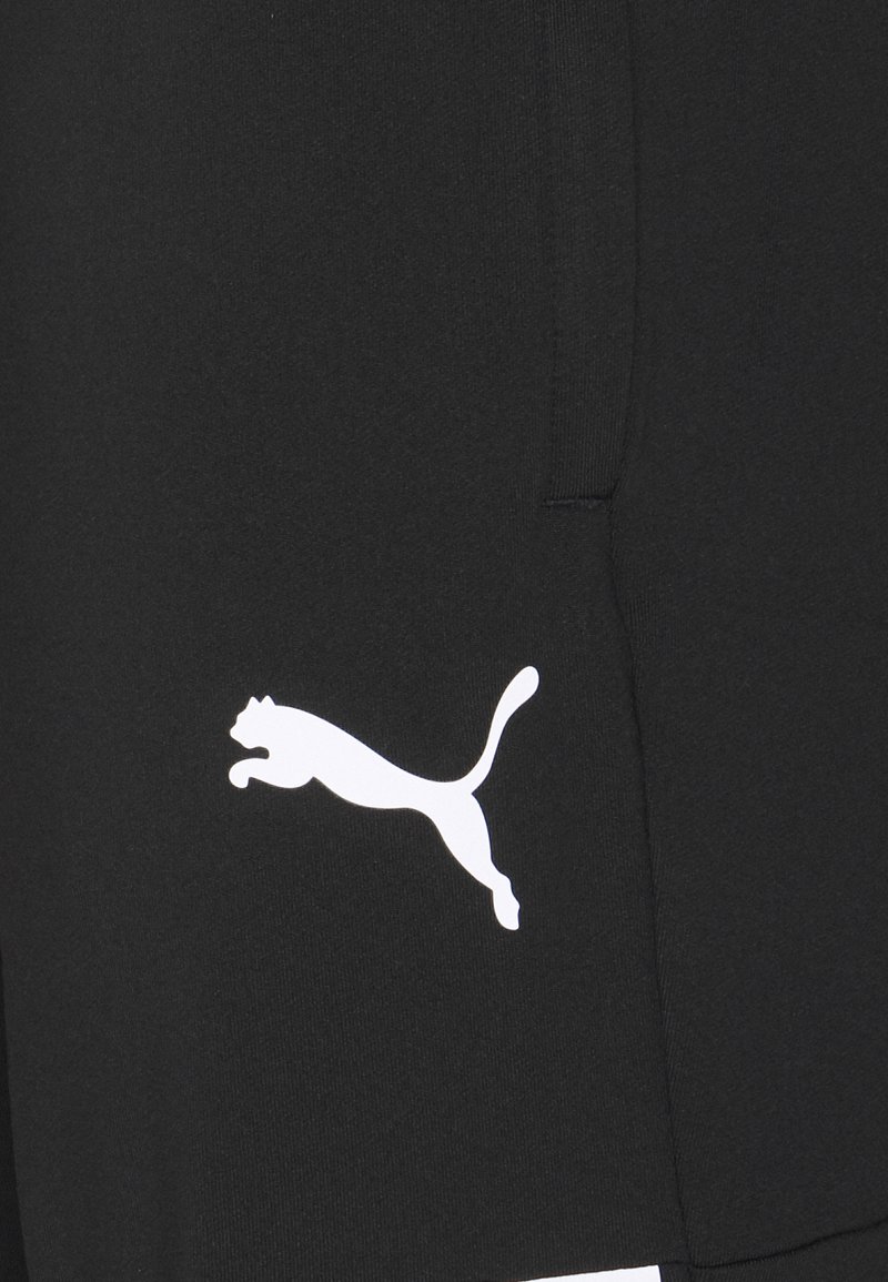 Puma TEAMLIGA TRAINING PANTS PRO - Teplákové kalhoty - black/white