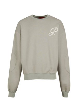 Sudadera gris claro con puños y dobladillo acanalados. Presenta un cuello redondo y un acento de logo en el lado izquierdo del pecho. Material de algodón suave.