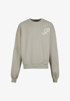 Lys grå sweatshirt med ribbede manchetter og kant. Har en rund hals og logoaccent på venstre bryst. Blødt bomuldsstof.