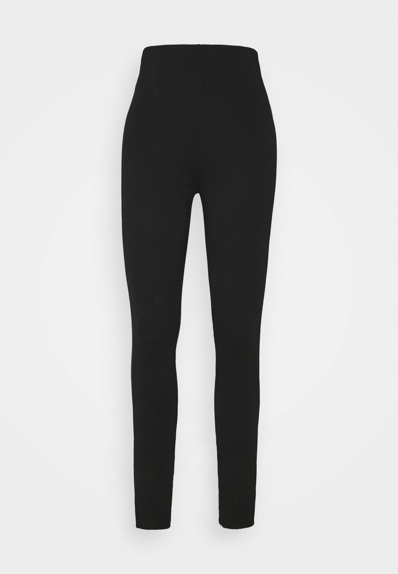 Leggings noirs taille haute, longueur intégrale, coupe slim, présentés sur un fond blanc uni.