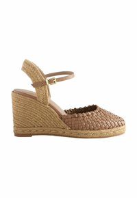 Wedge sandal with a woven brown leather upper, beige ankle strap, and jute-wrapped heel. Features a rounded toe and textured detailing.