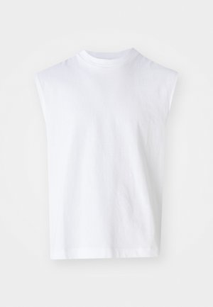 White sleeveless top made from cotton with a round neckline, a relaxed fit, and a smooth texture. Simple design with no patterns or accents.