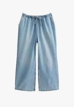 Lichtblauwe denim wijde broek met een elastische tailleband en een trekkoord. Voorzien van zijzakken en een ontspannen pasvorm over de benen.