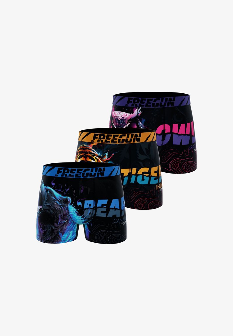 Ensemble de boxers pour hommes en tissu noir avec des graphismes d'animaux colorés : ours, tigre et hibou. Chaque paire comprend un lettrage de marque audacieux.