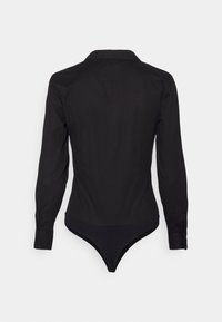 Body donna a maniche lunghe nera con colletto, polsini abbottonati e vestibilità su misura, mostrata da dietro su uno sfondo neutro.