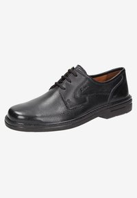 Zapato de vestir negro de cuero con un acabado suave, puntera redonda, diseño con cordones y un panel texturizado en contraste en el lateral. Suela de goma delgada.