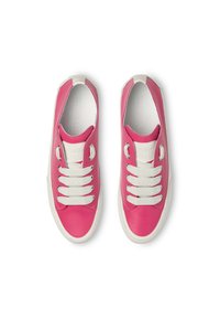 Pink leather sneakers feature white laces, a white rubber sole, and a smooth texture. The design includes a rounded toe and side vents.
