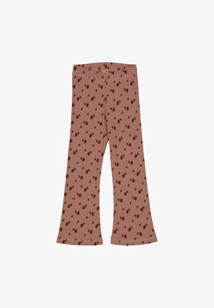 Roze legging met uitlopende pijpen, voorzien van een patroon van kleine donkerrode stippen. Gemaakt van zachte stof met een elastische tailleband.