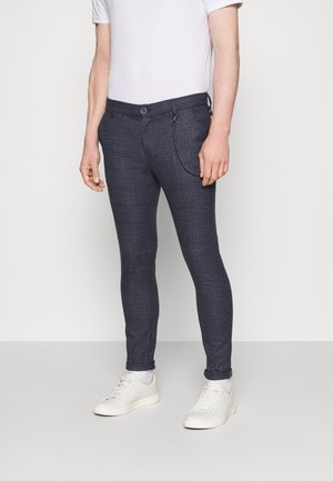 Spodnie materiałowe