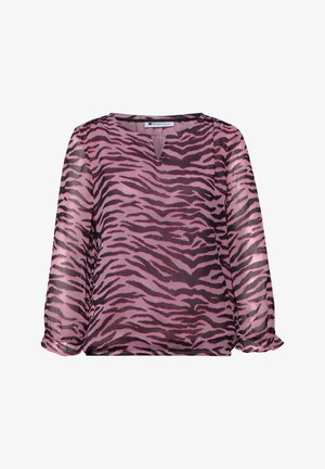 Blouse à manches longues imprimé zèbre rose et noir, col rond avec petite fente en V, poignets froncés et tissu légèrement transparent.