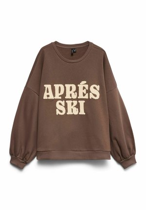 Brązowa bluza z prążkowanym dekoltem typu crew neck i bufkami na rękawach. Na przodzie znajduje się napis "APRÈS SKI" w kremowych, fakturowanych literach.