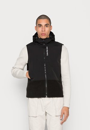 SUBTLE BLOCKING HOODED VEST - Smanicato - black