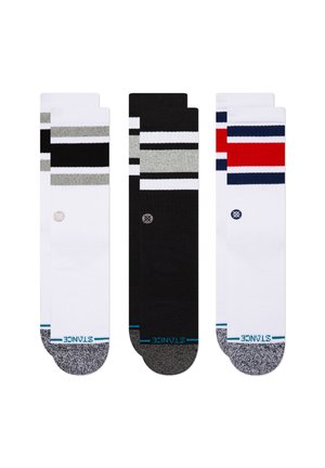 Three pairs of crew socks: one white with gray and black stripes, one solid black, and one white with red and navy stripes. Cotton blend, reinforced toes.