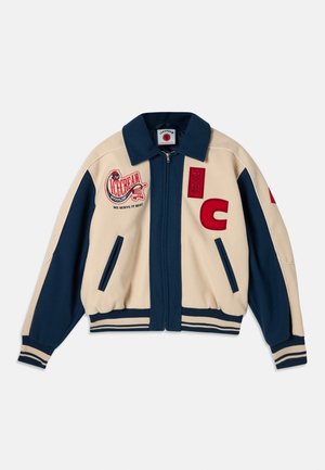 Blue and cream zip-up jacket with embroidered logos, ribbed cuffs, and two side pockets. Features contrasting stripes at the hem.