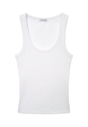 Top bianco in cotone a coste con spalline larghe e scollatura rotonda, etichetta "CALLIOPE" all'interno del colletto.