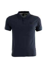 Marinblå polo skjorta i strukturerad tyg, med en tvåknäppningsplacket och en liten svart logotyp på vänster bröst.