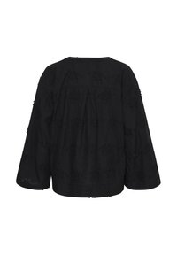 Blusa nera ricamata con maniche lunghe, una vestibilità rilassata e un collo rotondo con delicati motivi floreali su tutta la superficie.