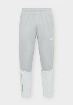Nike Performance, Tracksuit bottoms - light smoke grey/pure platinum volt
