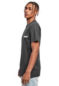 Merchcode UNFOLLOW  - Triko s potiskem - charcoal
