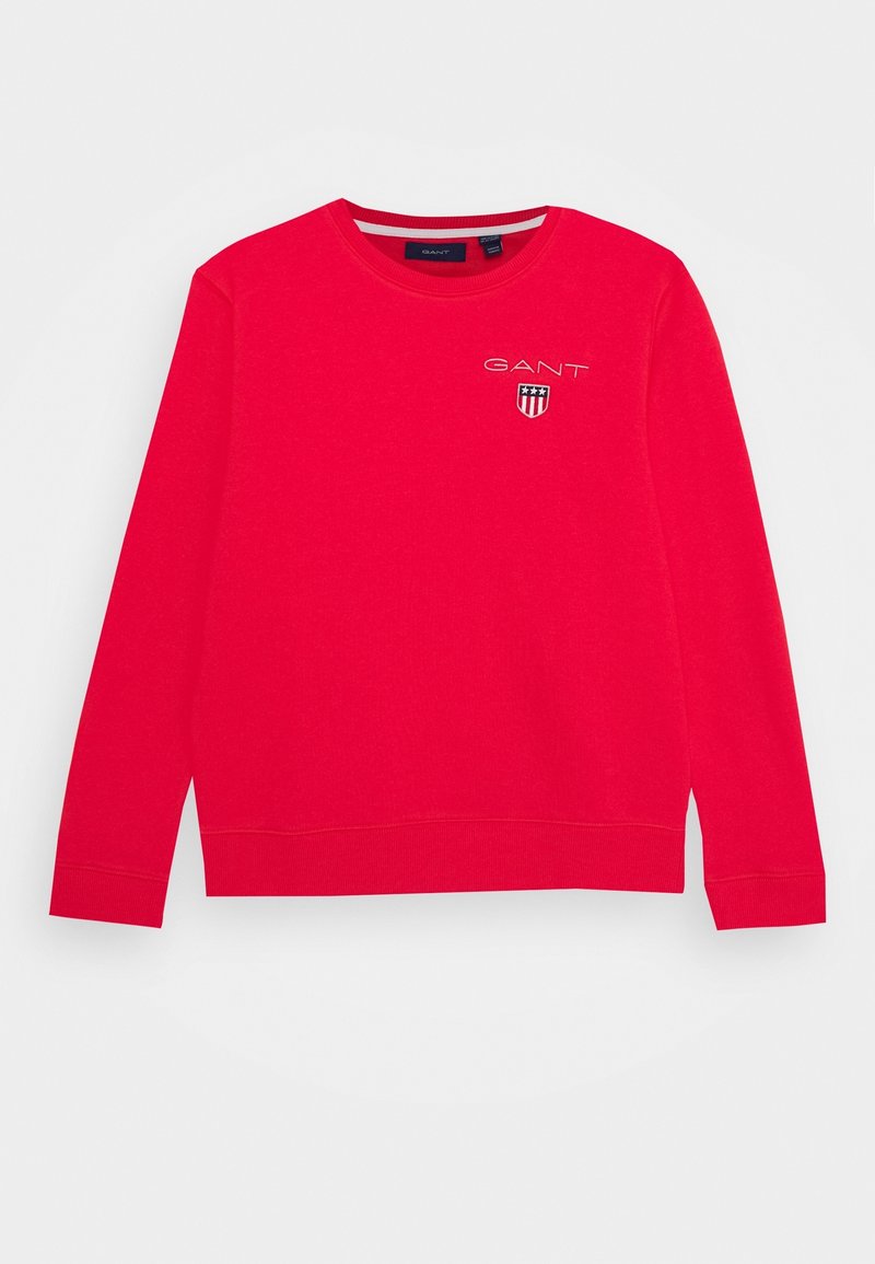 Sweat-shirt à col rond rouge en coton, avec manches longues et logo GANT avec emblème de bouclier sur la poitrine.